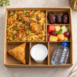 Chicken biryani meal box with dates and water UAE