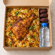 Complete Ramadan Iftar meal box with biryani dates fruit laban and water